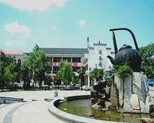 河南省新县属于哪个市?